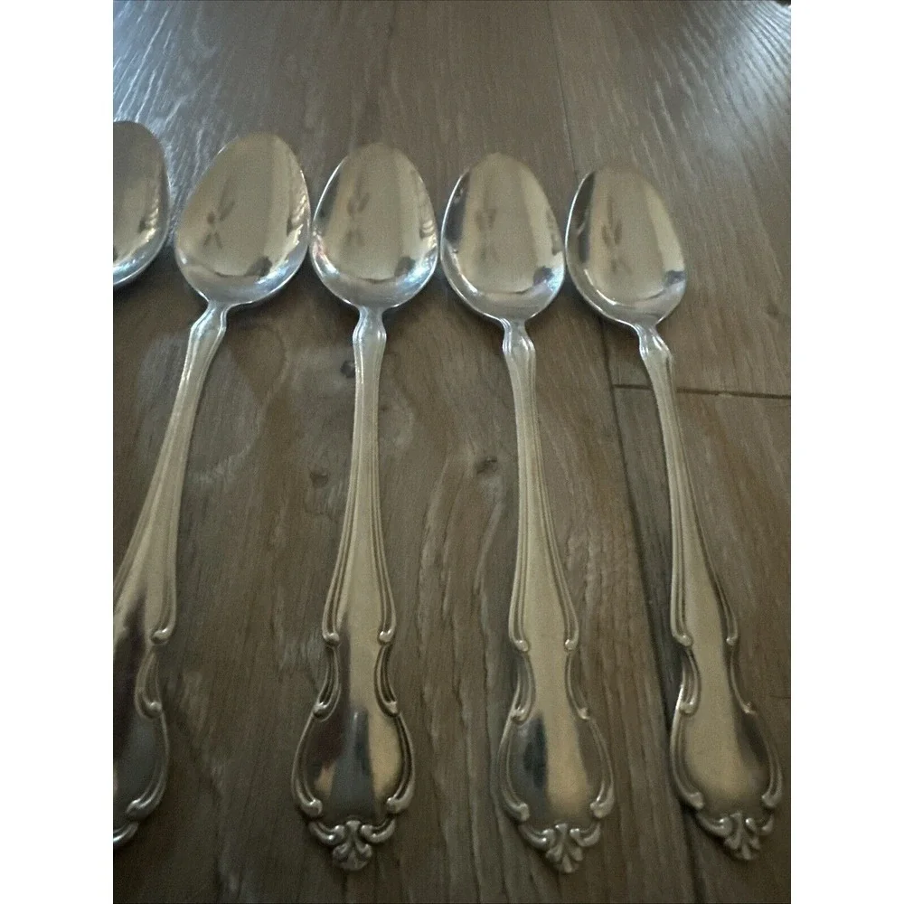 7 PCs Royal Splendor International stainless Scrolls‎ glossy Oval Place Spoons